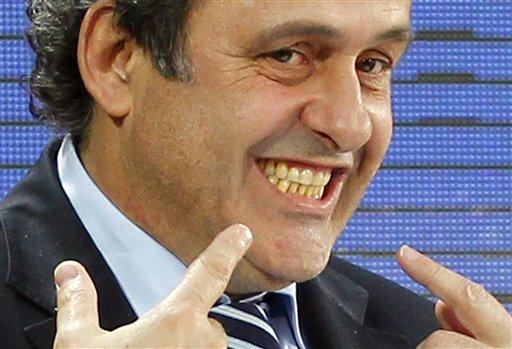 uefa_president_michel_platini_of_france_smiles_to__4d8bfea2cb
